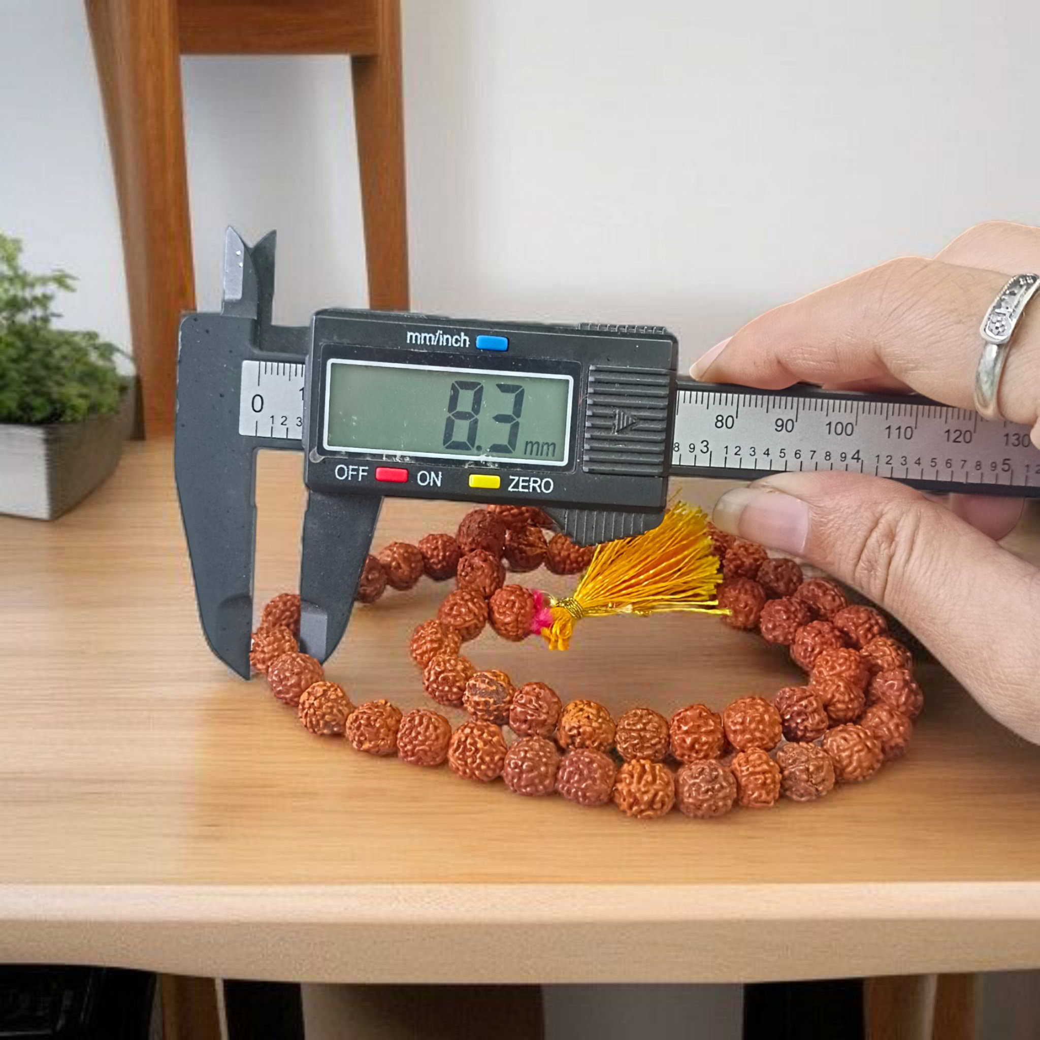 Close-up of a 54+1 bead Natural Rudraksha Mala with 8mm lab-certified beads