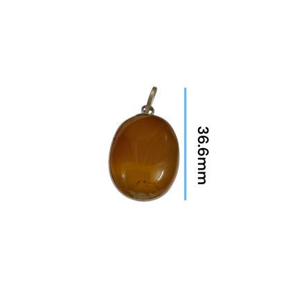 Close-up of the Original Yellow Aventurine Pendant, highlighting its smooth, vibrant yellow hue and polished surface on a necklace.