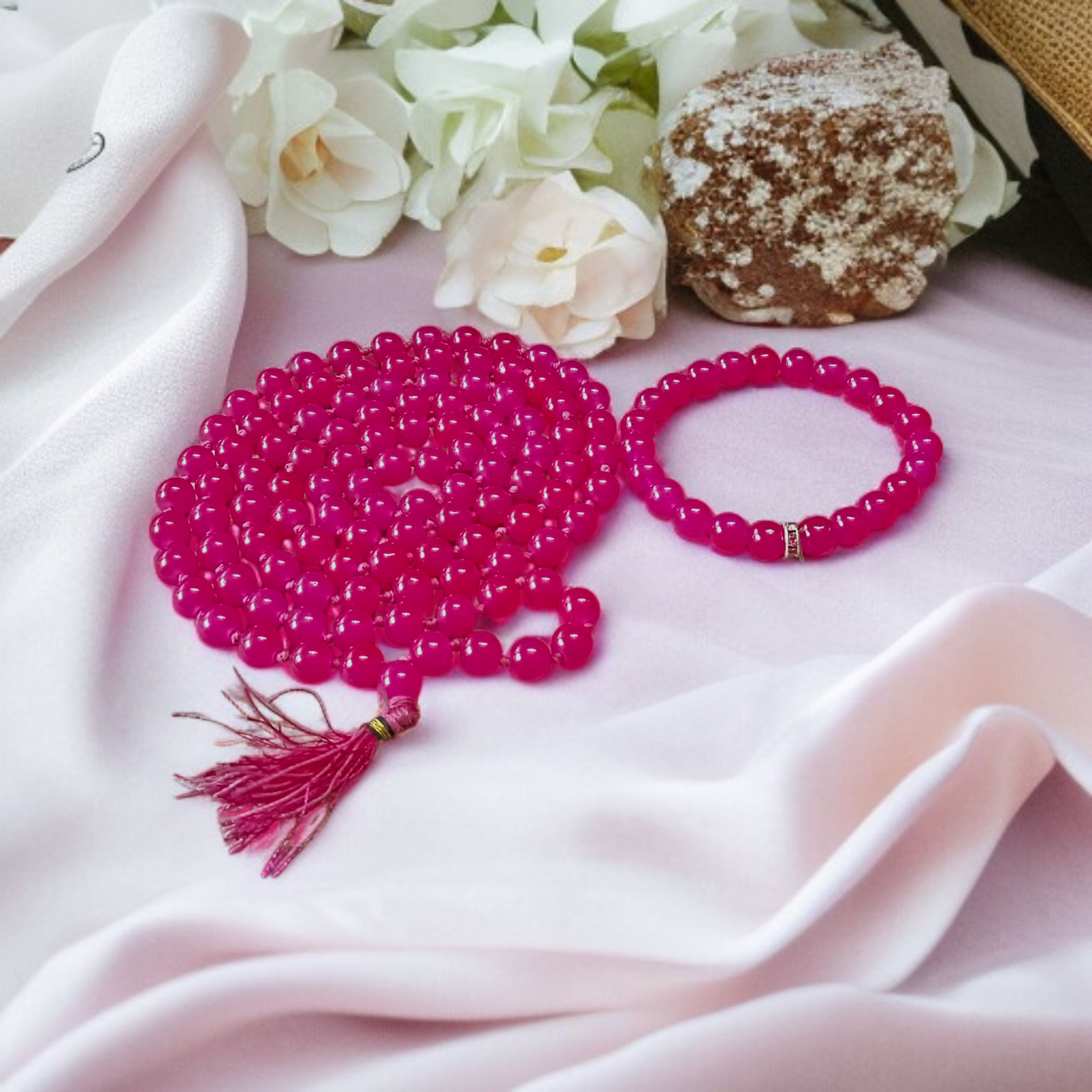 Combo of natural pink agate mala (108+1 beads) and matching bracelet with 6mm beads, used for healing, meditation, and emotional balance