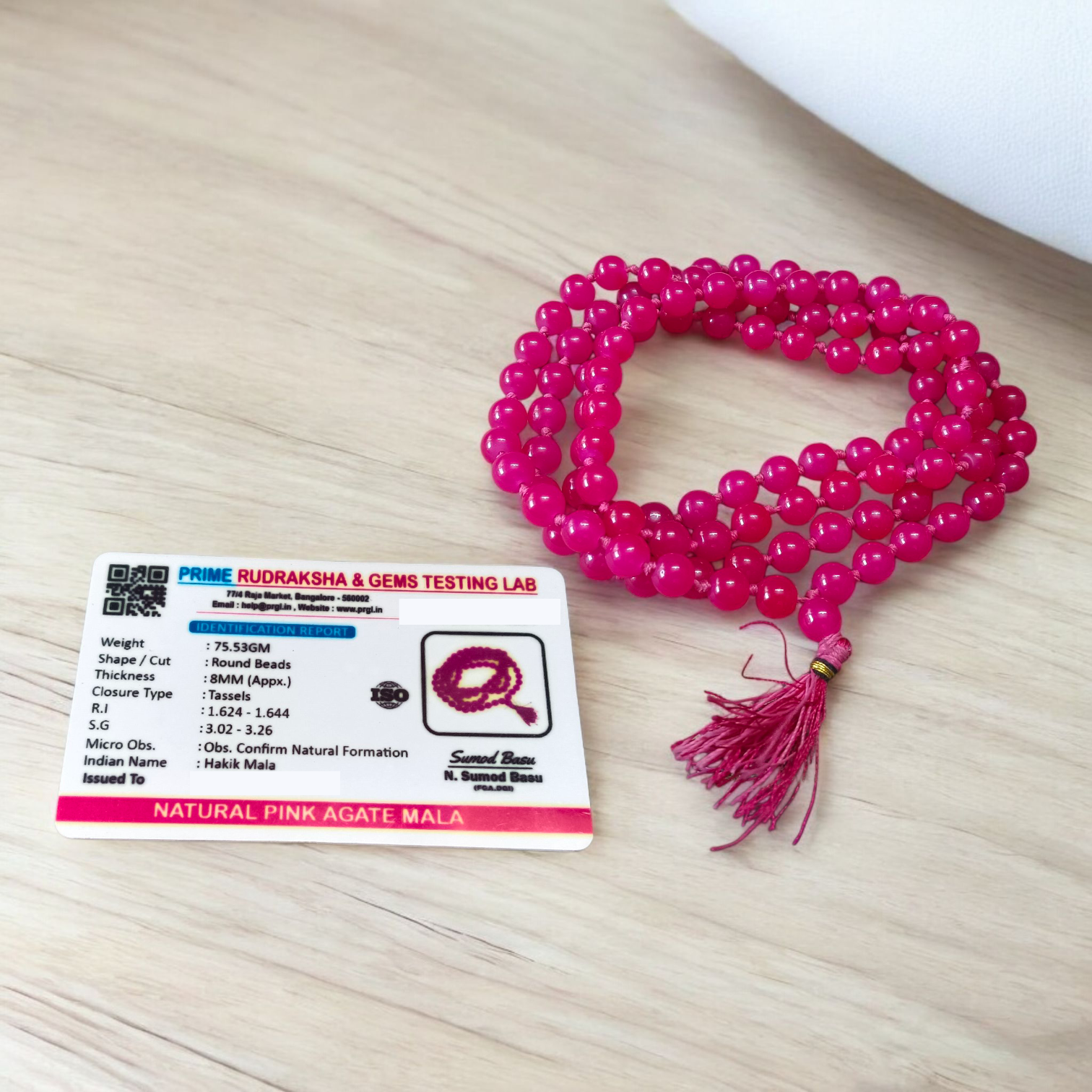 Combo of natural pink agate mala (108+1 beads) and matching bracelet with 6mm beads, used for healing, meditation, and emotional balance