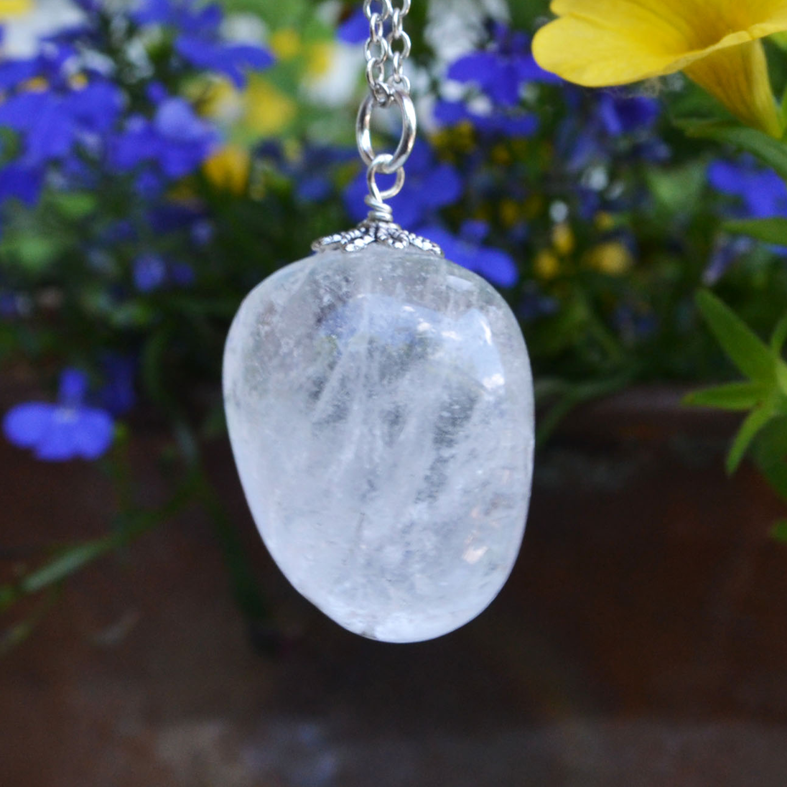 Crystal Pendant made from natural tumble stone, Lab Certified, used for healing, spiritual practices, and promoting positive energy.
