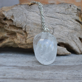 Crystal Pendant made from natural tumble stone, Lab Certified, used for healing, spiritual practices, and promoting positive energy.