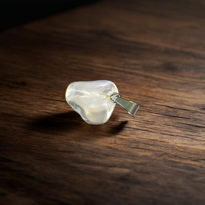 Crystal Quartz Pendant featuring a rough raw stone on a chain, Lab Certified, used for energy amplification, chakra healing, and spiritual growth