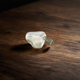 Crystal Quartz Pendant featuring a rough raw stone on a chain, Lab Certified, used for energy amplification, chakra healing, and spiritual growth