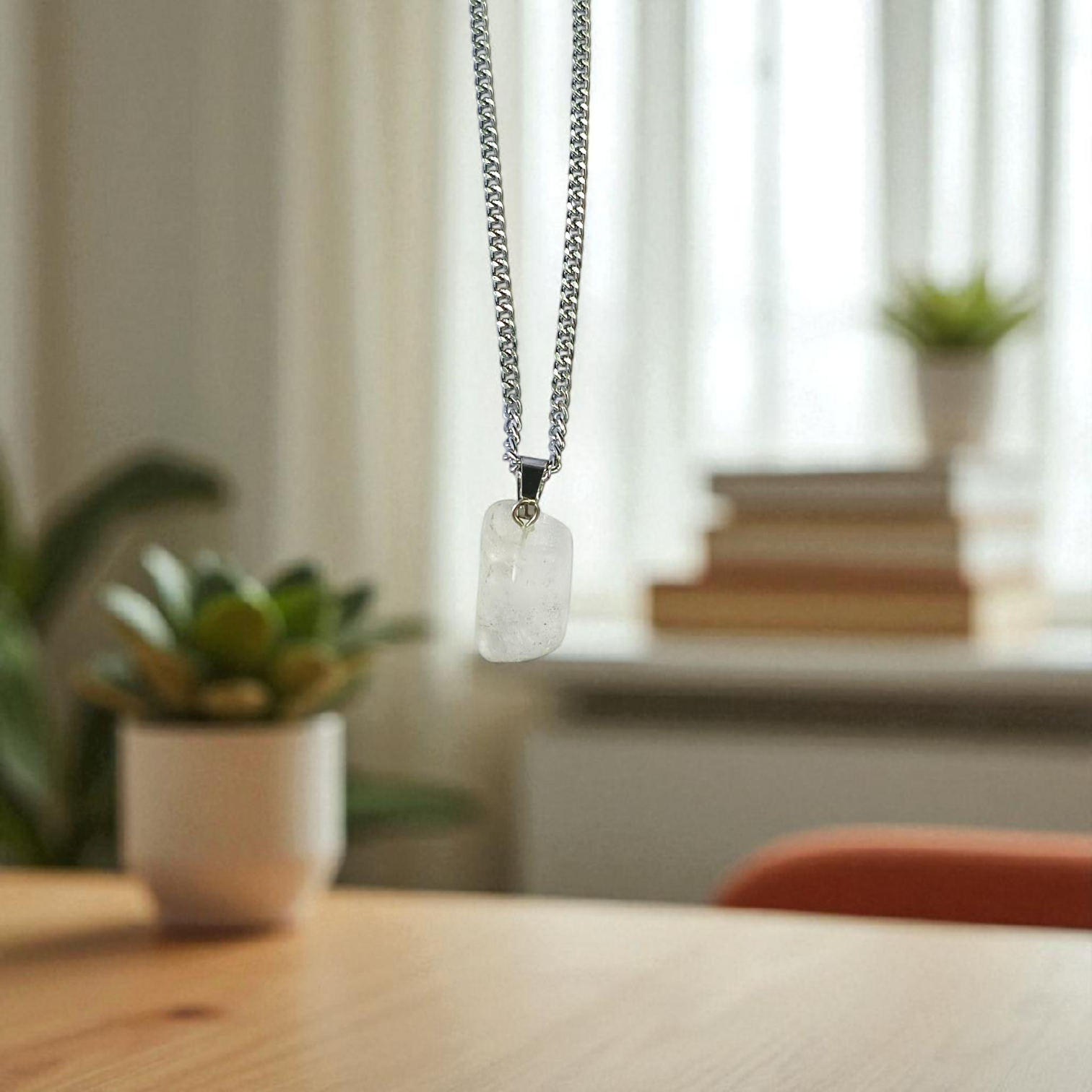 Crystal Quartz Pendant featuring a rough raw stone on a chain, Lab Certified, used for energy amplification, chakra healing, and spiritual growth