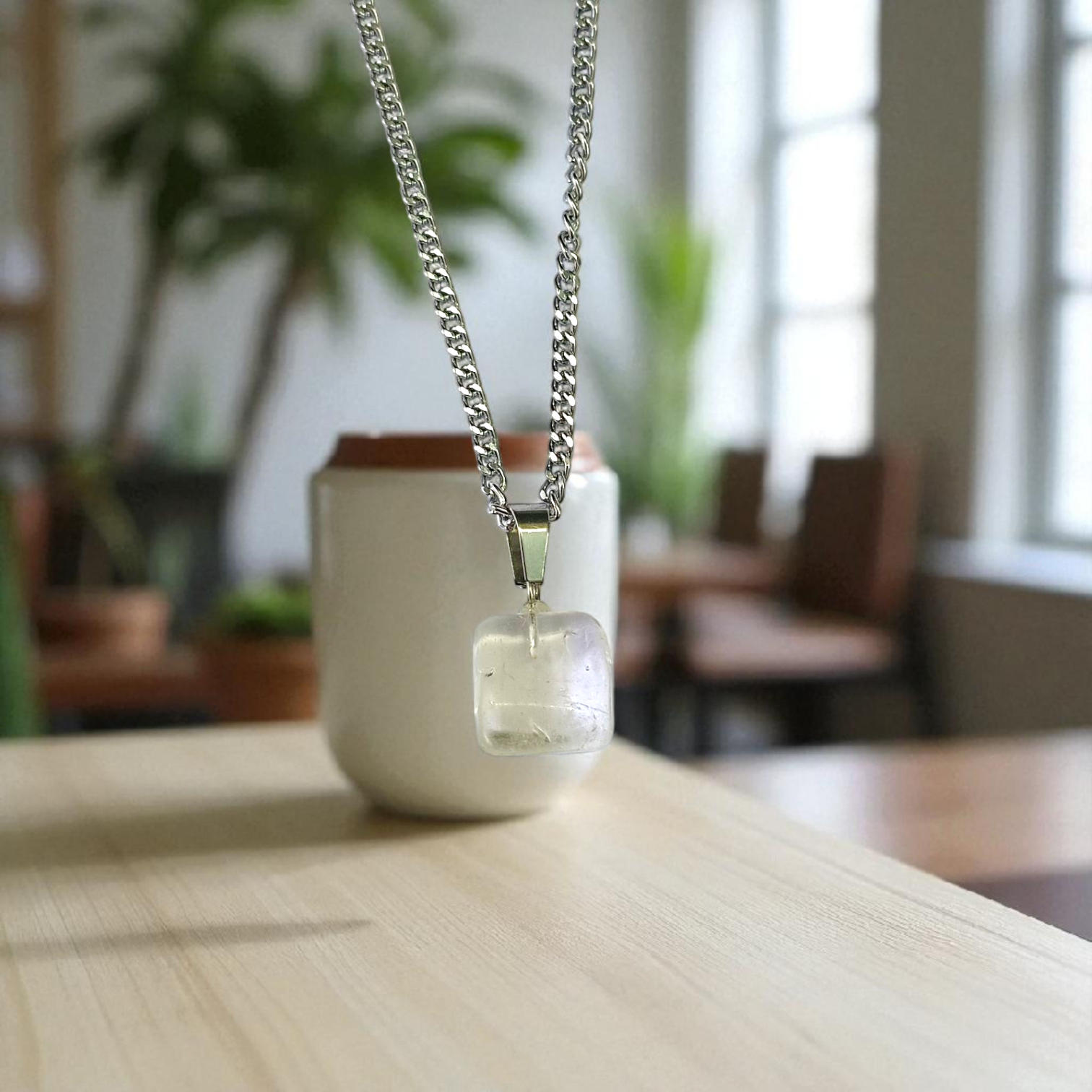 Crystal Quartz Pendant featuring a rough raw stone on a chain, Lab Certified, used for energy amplification, chakra healing, and spiritual growth