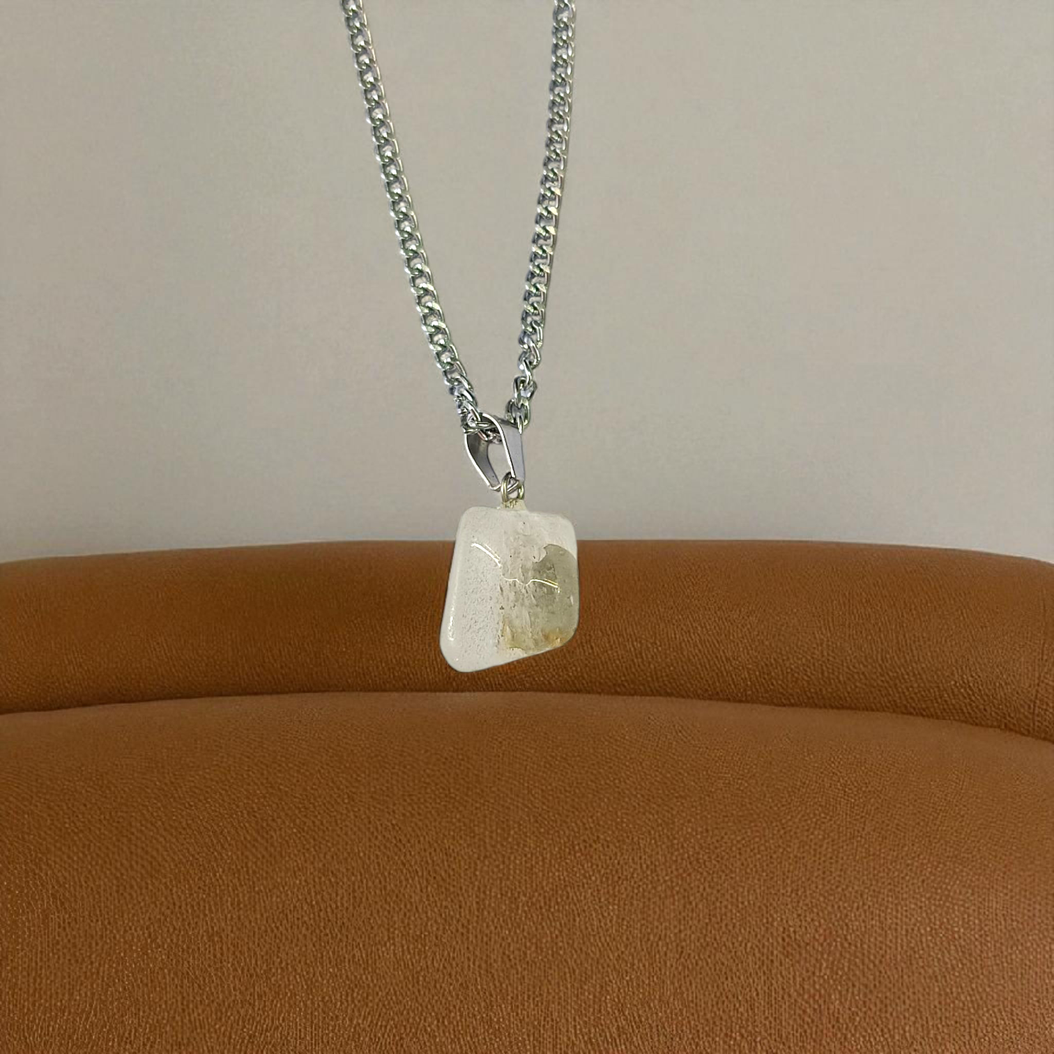 Crystal Quartz Pendant featuring a rough raw stone on a chain, Lab Certified, used for energy amplification, chakra healing, and spiritual growth