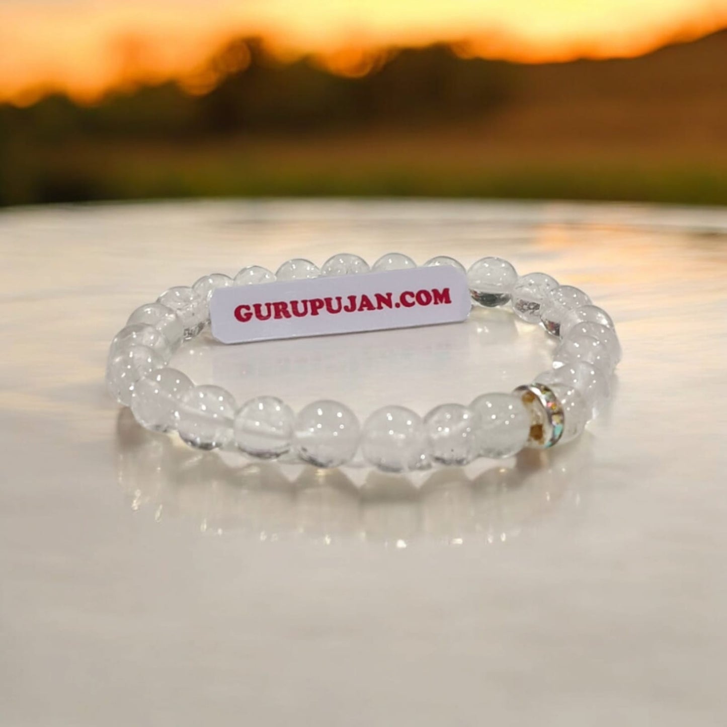 Crystal Sphatik Bracelet with natural transparent 7MM beads, lab certified, stretchable design, promoting peace, clarity, and positive energy.