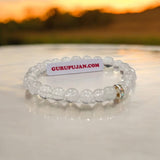 Crystal Sphatik Bracelet with natural transparent 7MM beads, lab certified, stretchable design, promoting peace, clarity, and positive energy.
