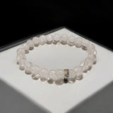 Crystal Sphatik Bracelet with natural transparent 7MM beads, lab certified, stretchable design, promoting peace, clarity, and positive energy.