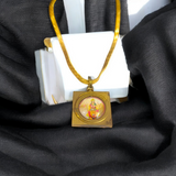 Durga Beesa Locket with gold-plated chain, engraved with the Durga Beesa mantra, offering spiritual protection and divine blessings.