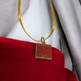 Durga Beesa Locket with gold-plated chain, engraved with the Durga Beesa mantra, offering spiritual protection and divine blessings.