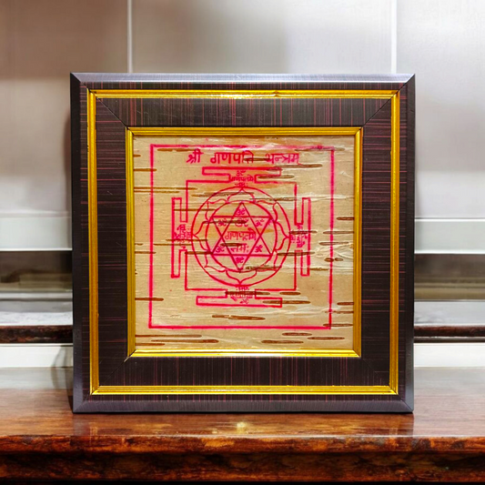 Ganpati Yantra inscribed on Bhojpatra, framed beautifully, designed for spiritual rituals and Vastu remedies.