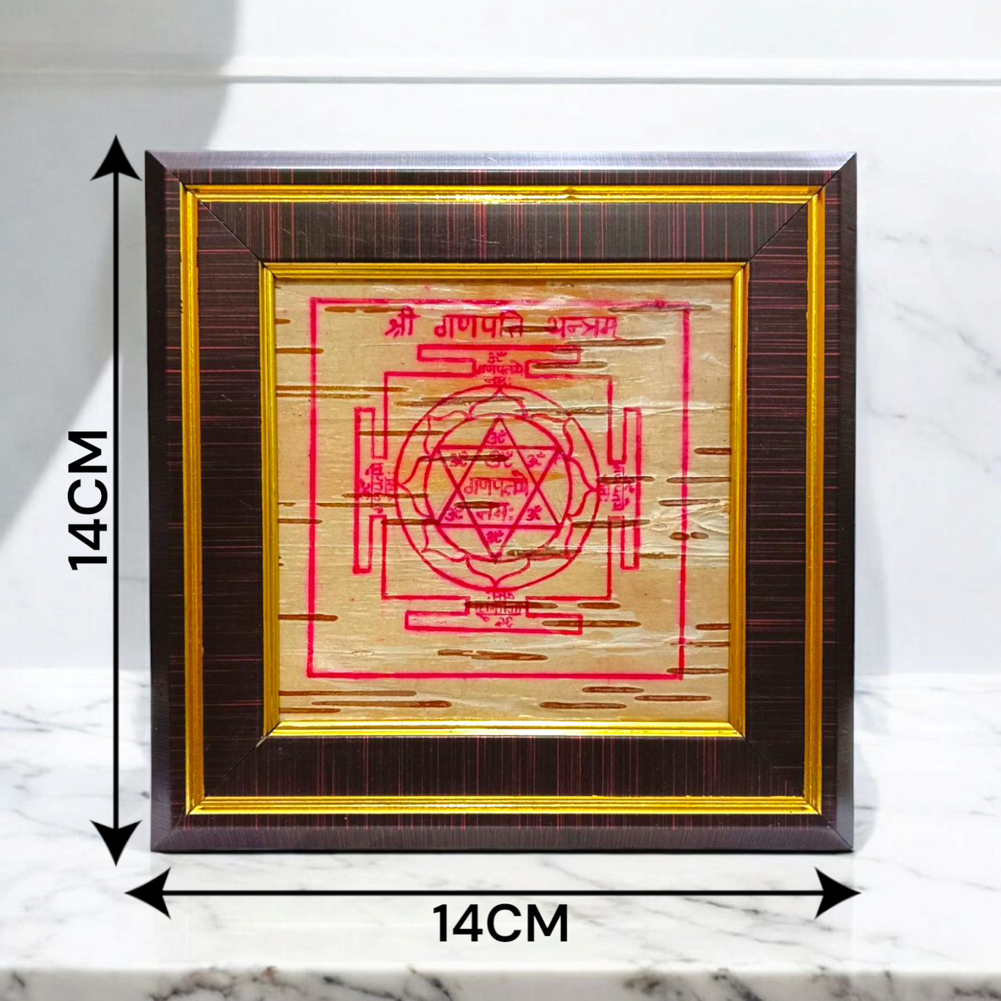 Ganpati Yantra inscribed on Bhojpatra, framed beautifully, designed for spiritual rituals and Vastu remedies.