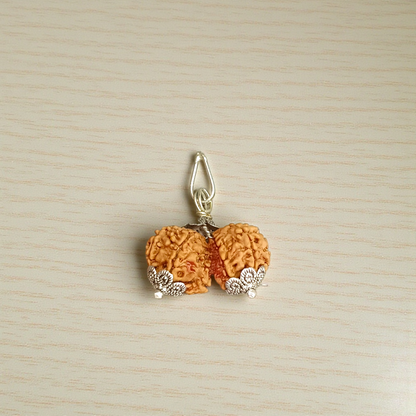 Gauri Shankar Rudraksha lab-certified bead, symbolizing the divine union of Lord Shiva and Goddess Parvati, ideal for spiritual growth, peace, and prosperity