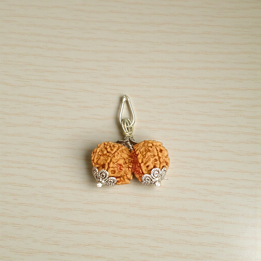 Gauri Shankar Rudraksha lab-certified bead, symbolizing the divine union of Lord Shiva and Goddess Parvati, ideal for spiritual growth, peace, and prosperity