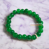 Green Agate Bracelet with 8MM natural beads, lab certified, stretchable design, promoting harmony, prosperity, and emotional healing.