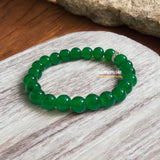 Green Agate Bracelet with 8MM natural beads, lab certified, stretchable design, promoting harmony, prosperity, and emotional healing.
