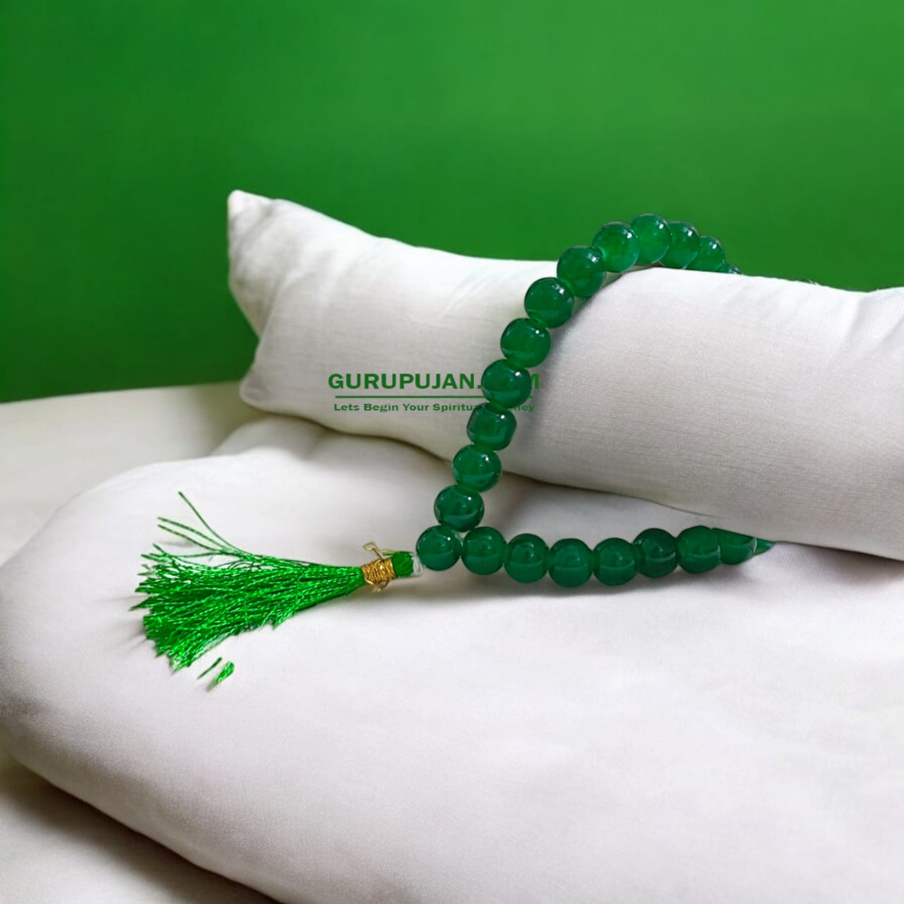 Green Agate Mala with 108 beads displayed on a spiritual setup, showcasing natural green hues and smooth polished finish