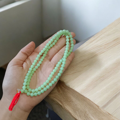 Green Moti Mala with 108+1 beads for meditation, emotional healing, and spiritual practice