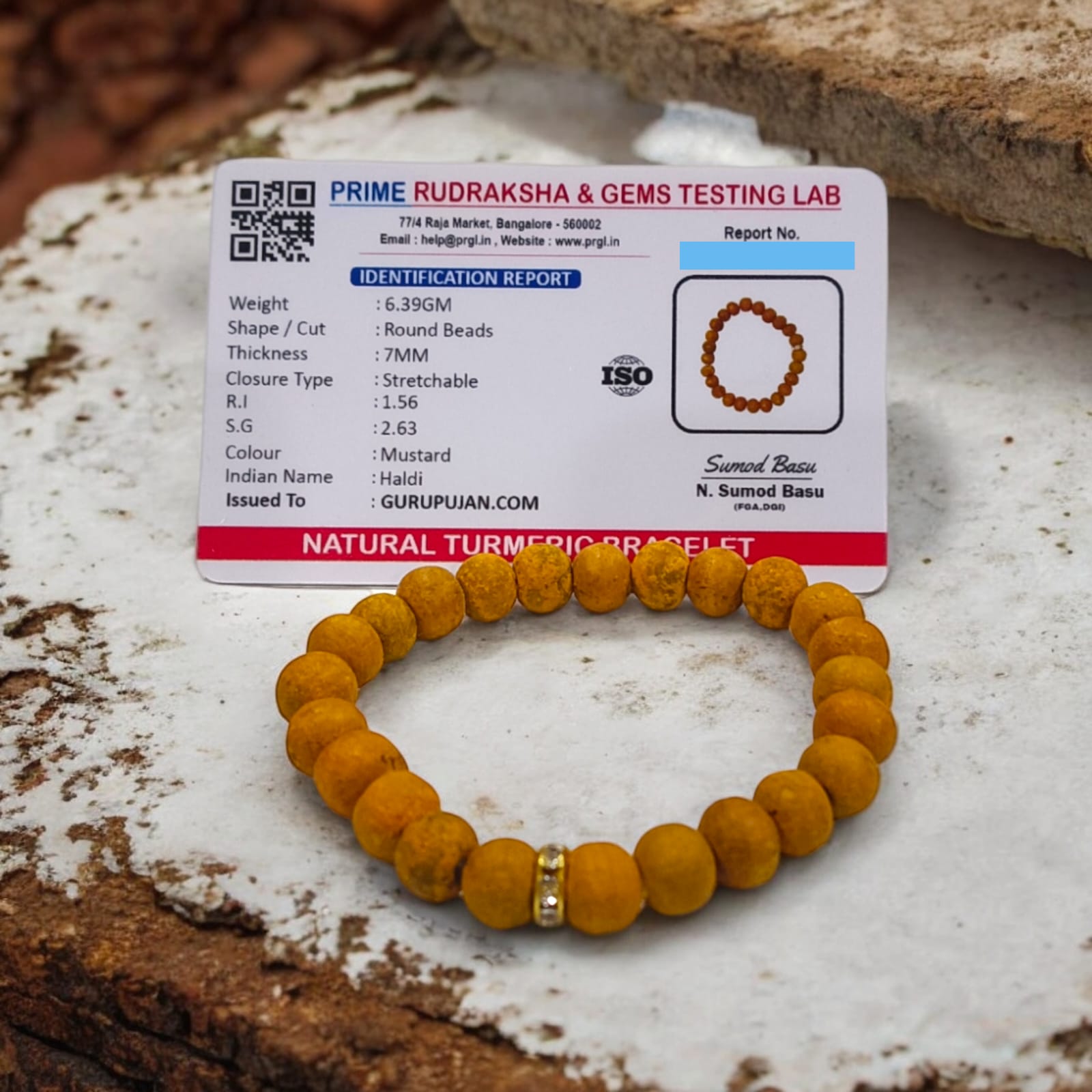 Haldi Bracelet made of 8MM natural turmeric beads, stretchable design, and certificate of authenticity for spiritual and healing benefits.