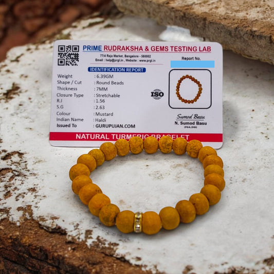 Haldi Bracelet made of 8MM natural turmeric beads, stretchable design, and certificate of authenticity for spiritual and healing benefits.