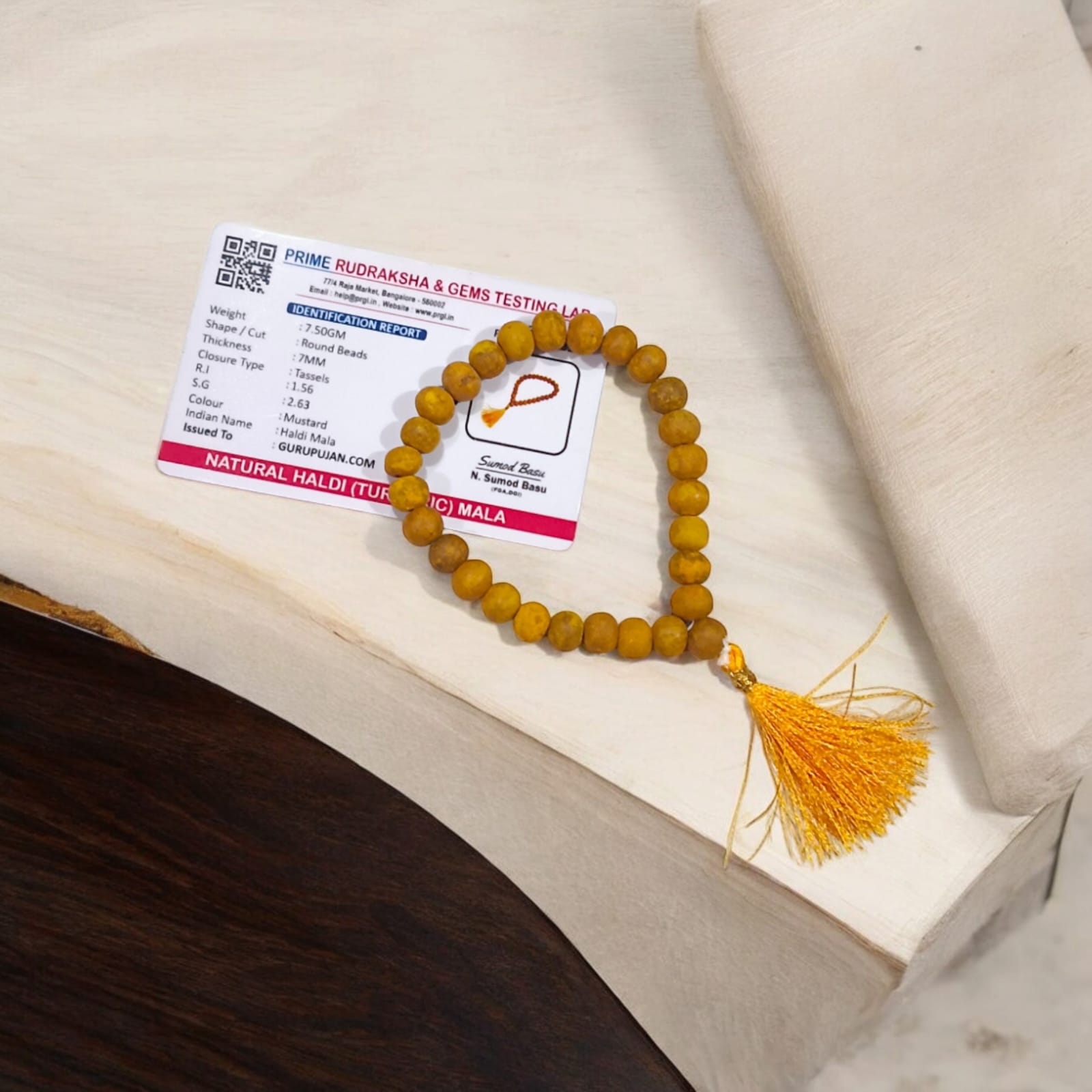 Haldi Mala crafted from natural turmeric beads, lab-certified, available for Jaap and wearing, offering health and purification benefits.