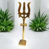Handcrafted Brass Trishul with Damru figurine, a symbol of Lord Shiva’s power and protection, perfect for pooja rituals and home decor.

