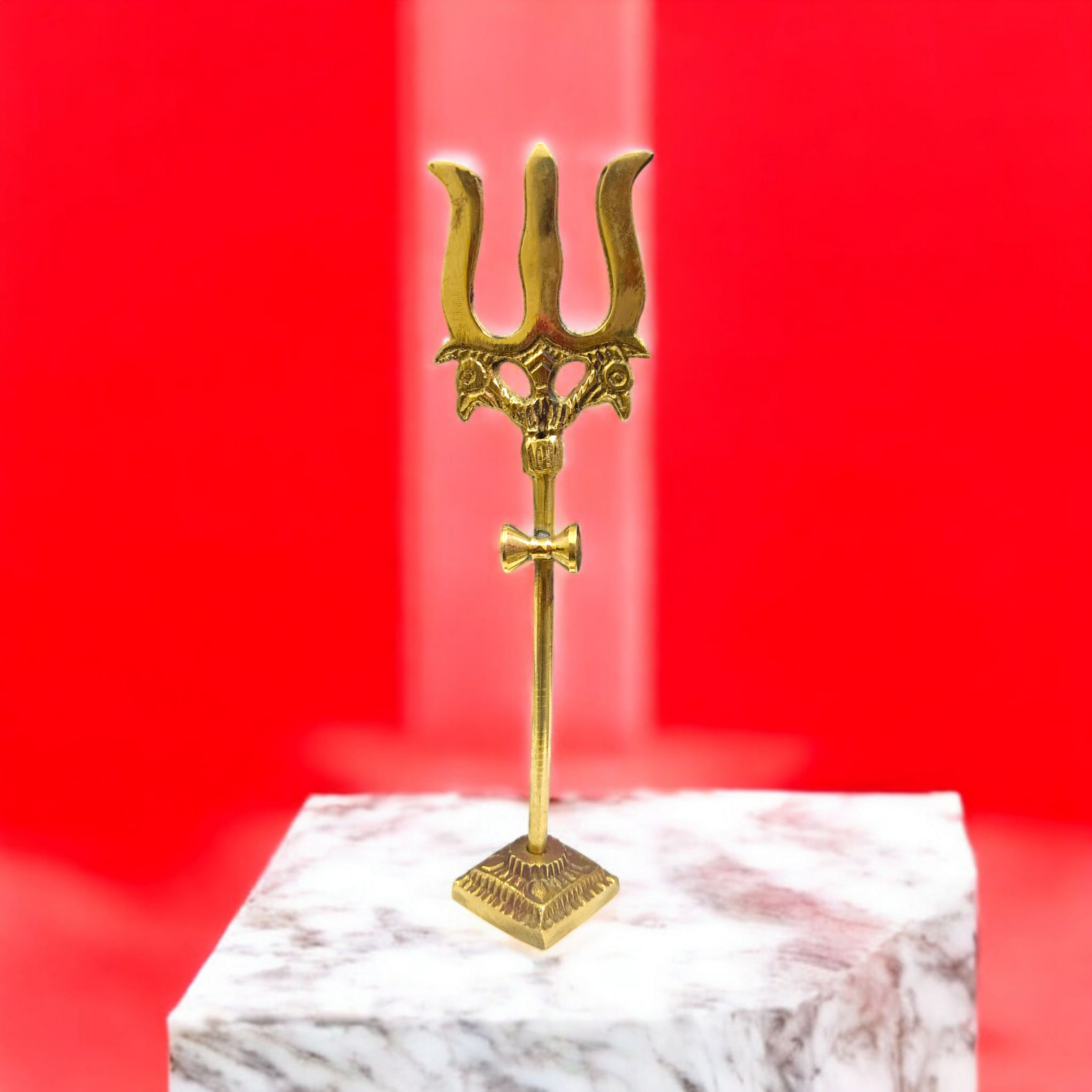 Handcrafted Brass Trishul with Damru figurine, a symbol of Lord Shiva’s power and protection, perfect for pooja rituals and home decor.

