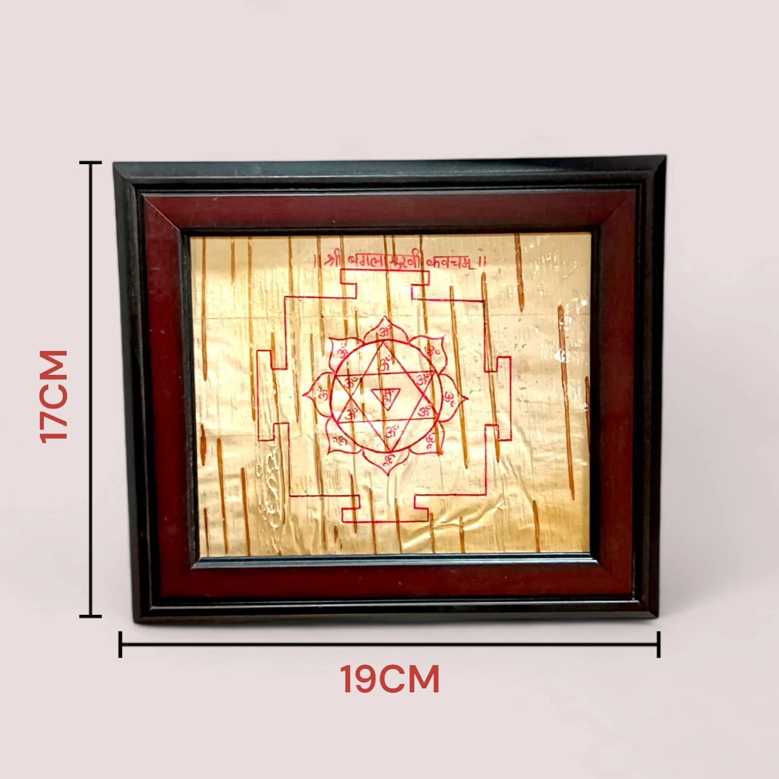 Handmade Baglamukhi Kawach engraved on Bhojpatra, framed in wood for spiritual protection and blessings, ideal for home or office.