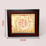 Handmade Baglamukhi Kawach engraved on Bhojpatra, framed in wood for spiritual protection and blessings, ideal for home or office.