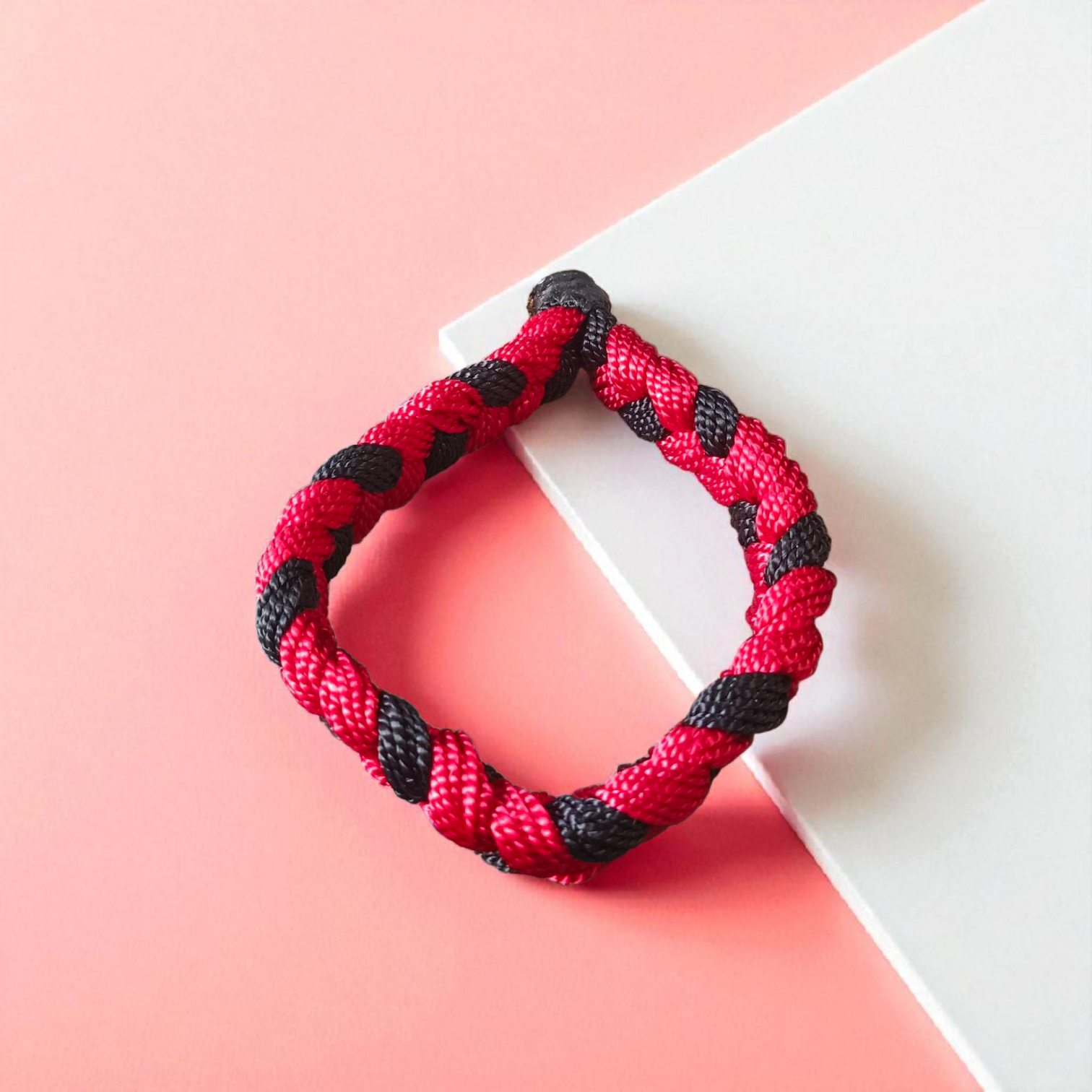 Handmade red and black cotton bracelet threads for men and women, symbolizing protection and style, set of 2 by Gurupujan