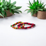 Handmade thread bracelet set of 4 in red, yellow, black, and multicolor for men and women, symbol of protection and spirituality by Gurupujan