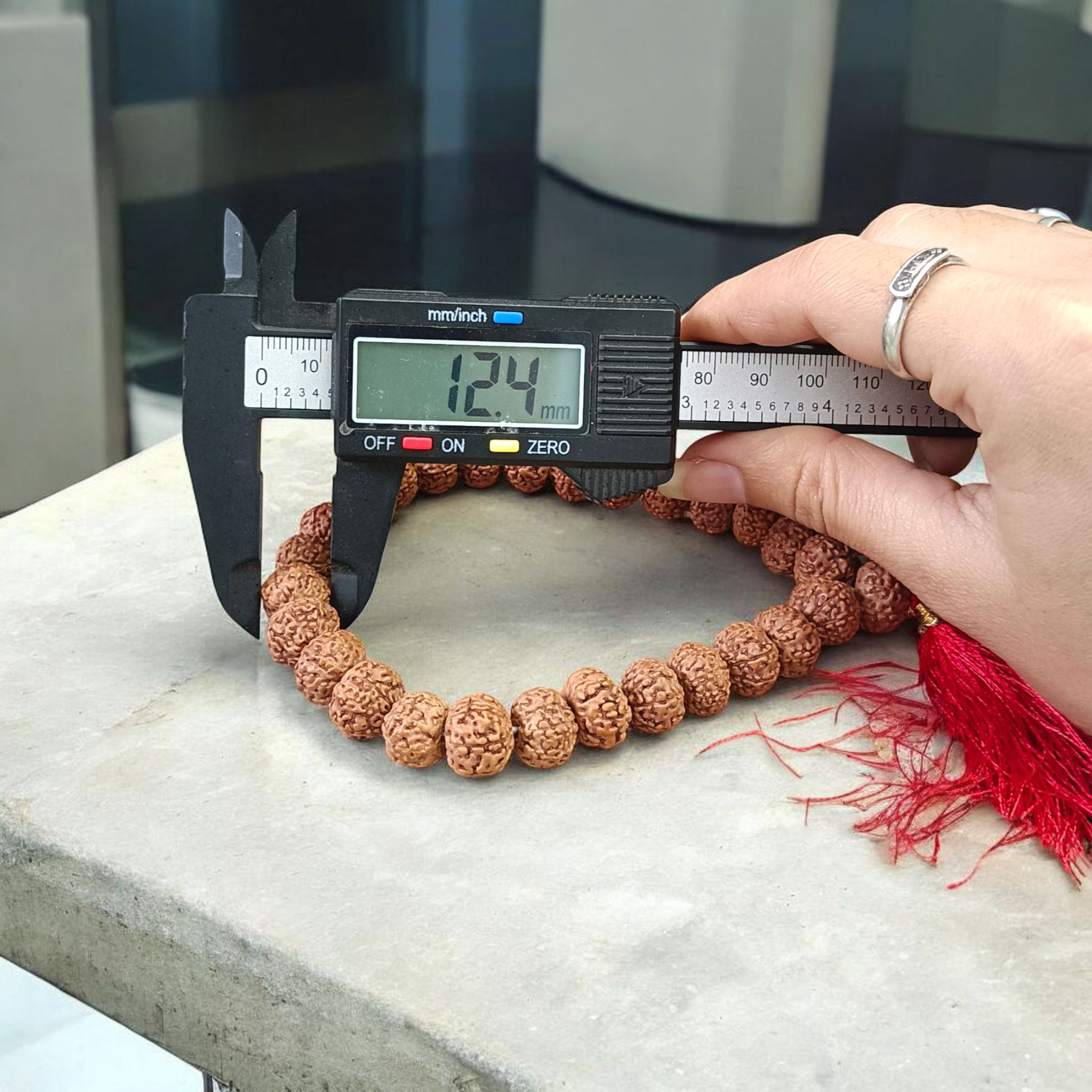 Image of 8 Mukhi Rudraksha mala with 27+1 and 108+1 bead variants displayed, showing lab certification badge and natural brown Rudraksha beads
