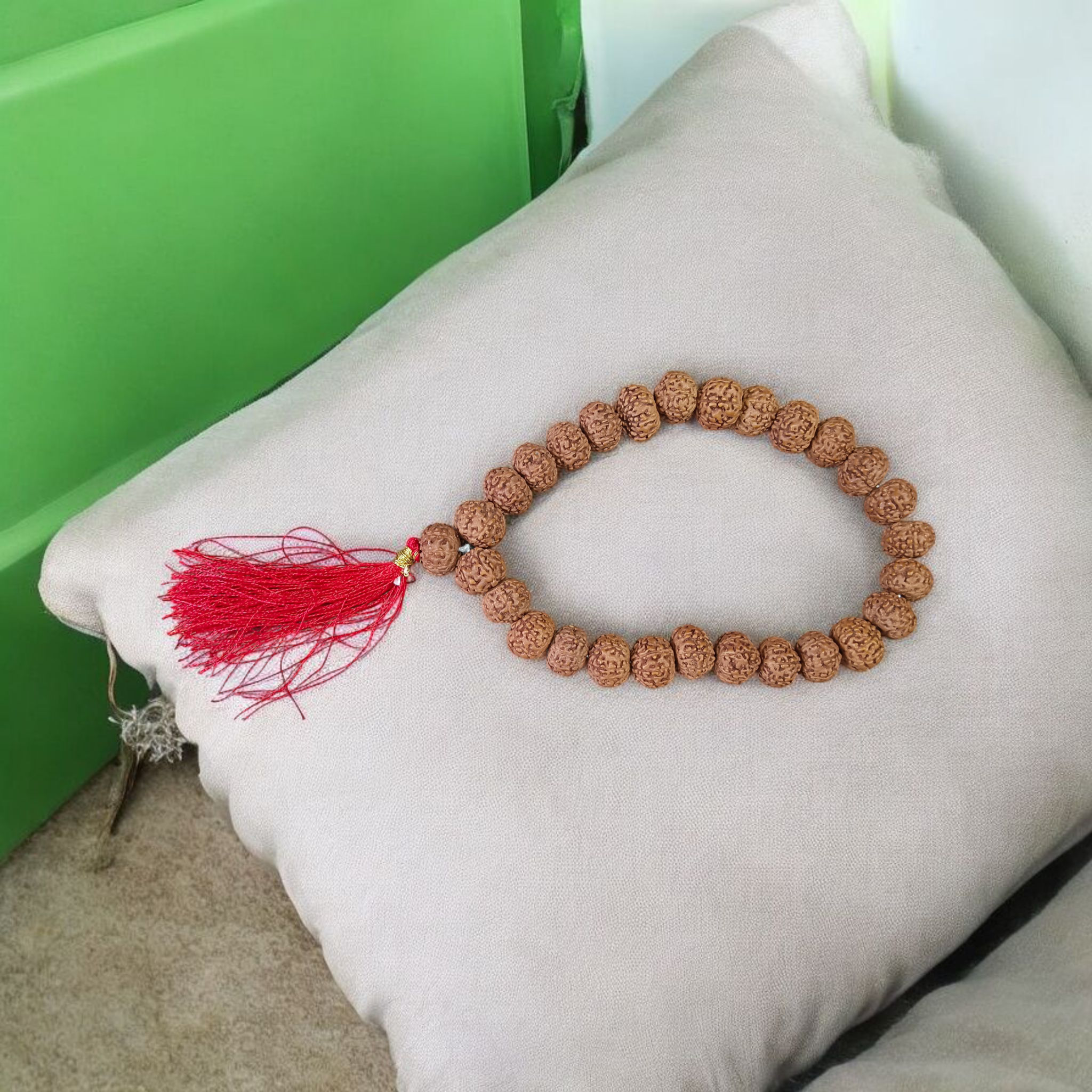 Image of 8 Mukhi Rudraksha mala with 27+1 and 108+1 bead variants displayed, showing lab certification badge and natural brown Rudraksha beads