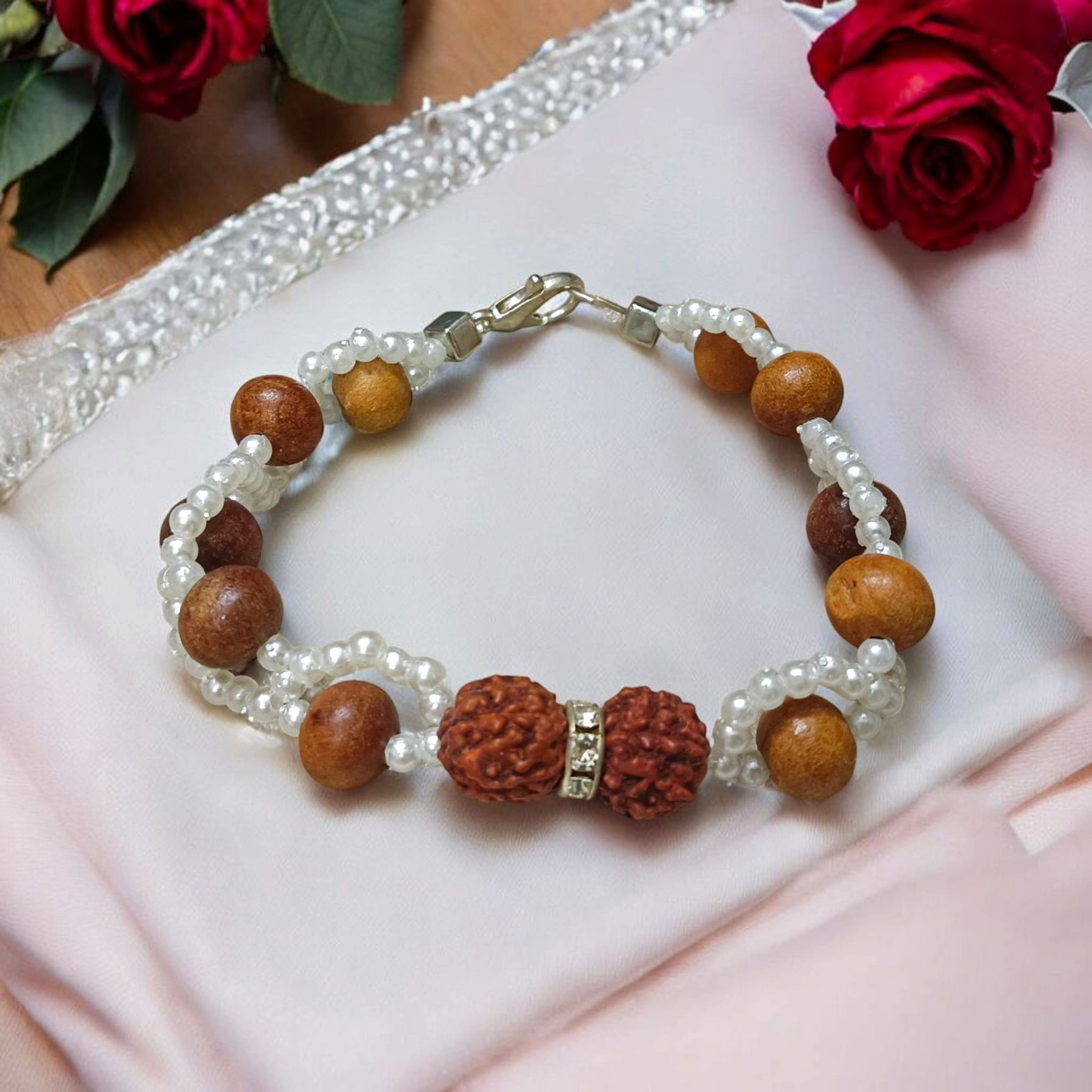 Image of Natural Rudraksha and Sandalwood Bracelet with lab-certified beads, used for energy balancing, protection, and spiritual well-being