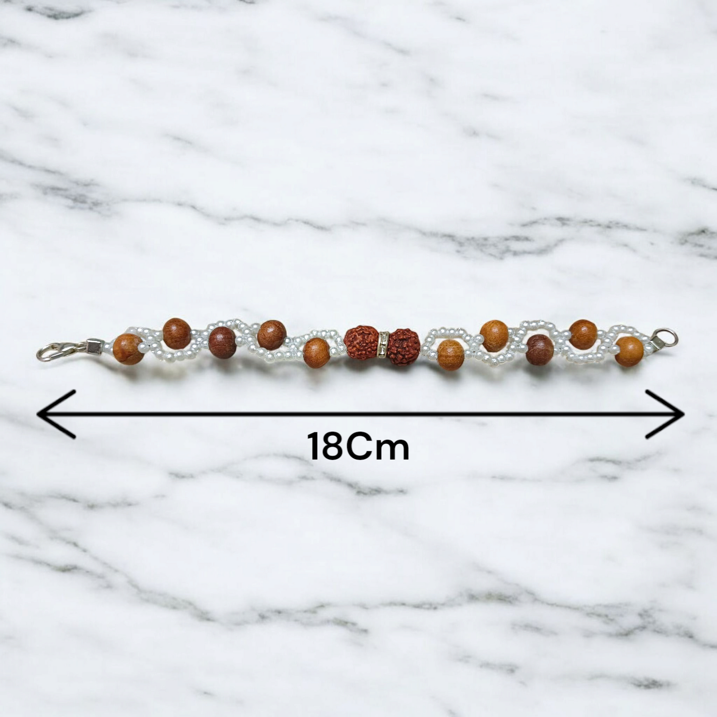 Image of Natural Rudraksha and Sandalwood Bracelet with lab-certified beads, used for energy balancing, protection, and spiritual well-being