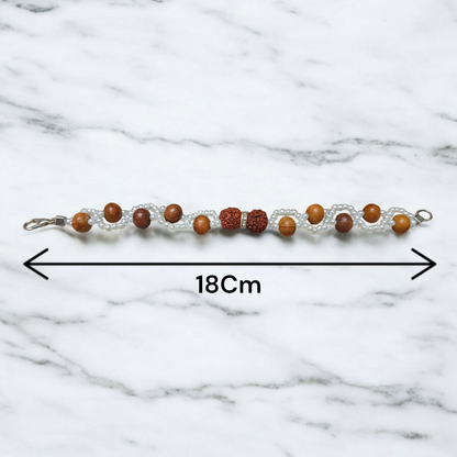 Image of Natural Rudraksha and Sandalwood Bracelet with lab-certified beads, used for energy balancing, protection, and spiritual well-being
