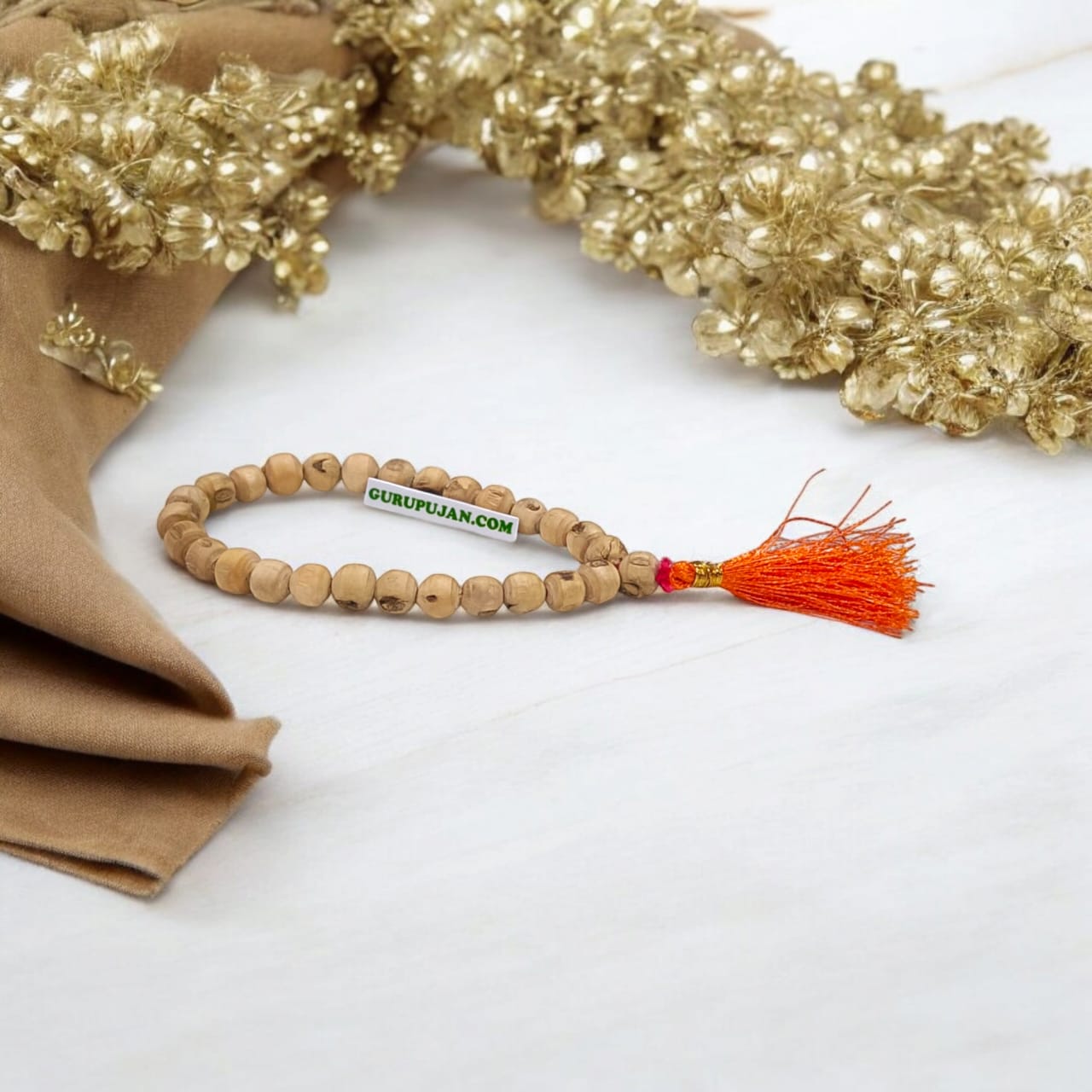 Image of Natural Tulsi Mala with 108+1 beads used for mantra chanting, meditation, and spiritual rituals.