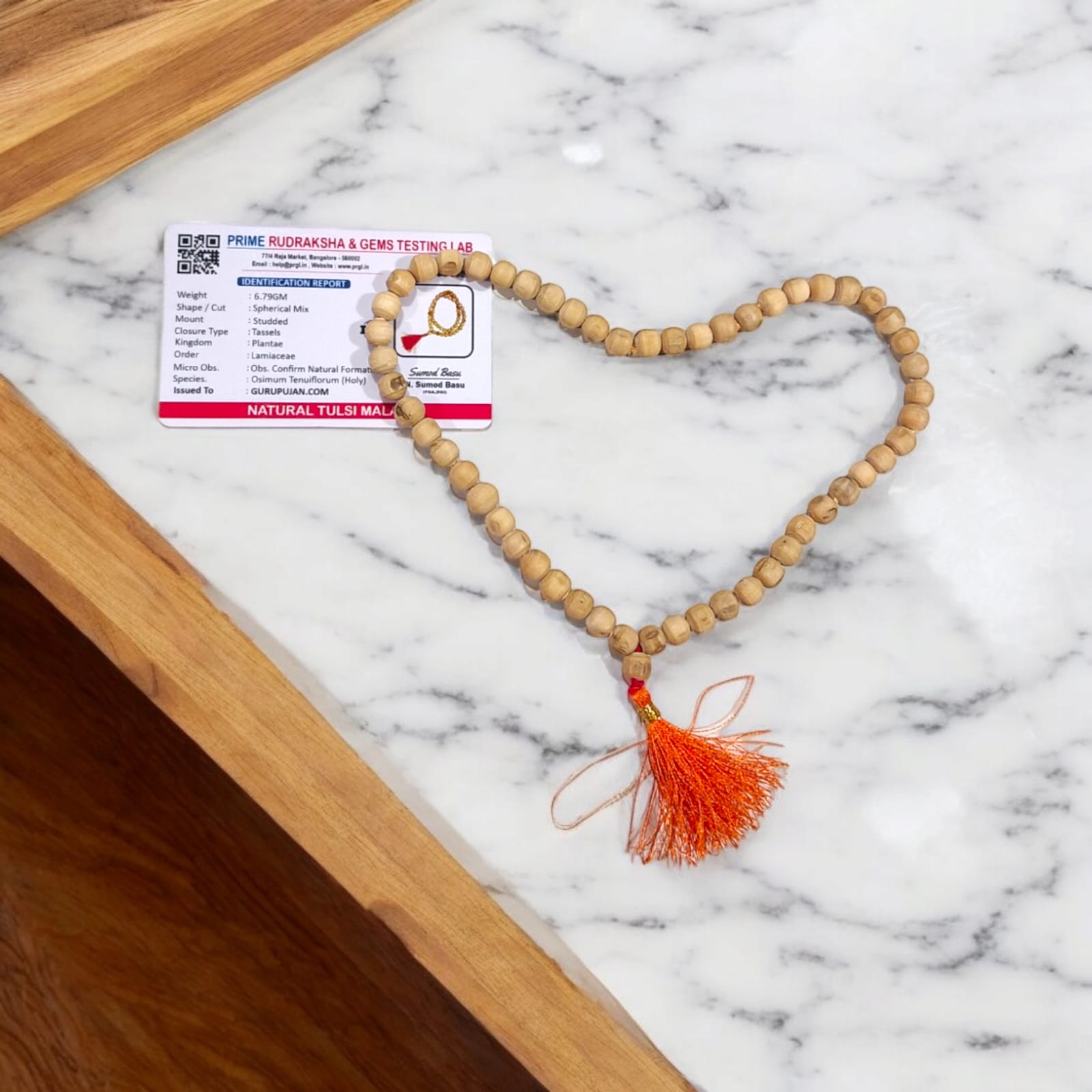 Image of Natural Tulsi Mala with 108+1 beads used for mantra chanting, meditation, and spiritual rituals.
