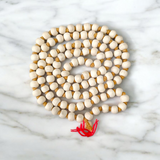 Image of Natural Tulsi Mala with 108+1 beads used for mantra chanting, meditation, and spiritual rituals