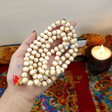 Image of Natural Tulsi Mala with 108+1 beads used for mantra chanting, meditation, and spiritual rituals