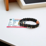 Image of a Lab Certified Hessonite and Black Agate Bracelet with 8mm beads, used for Rahu balancing, career growth, and spiritual stability