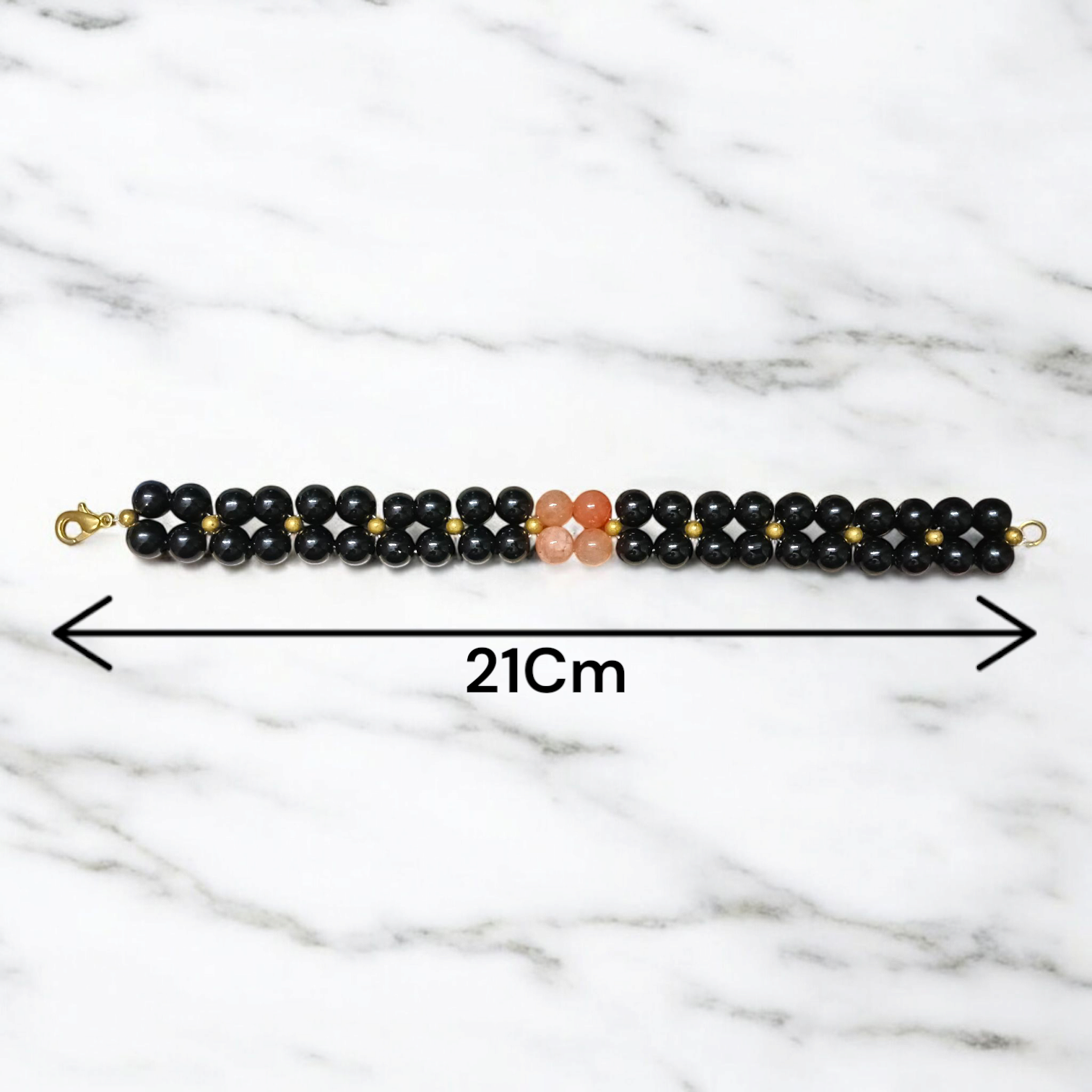 Image of a Lab Certified Hessonite and Black Agate Bracelet with 8mm beads, used for Rahu balancing, career growth, and spiritual stability