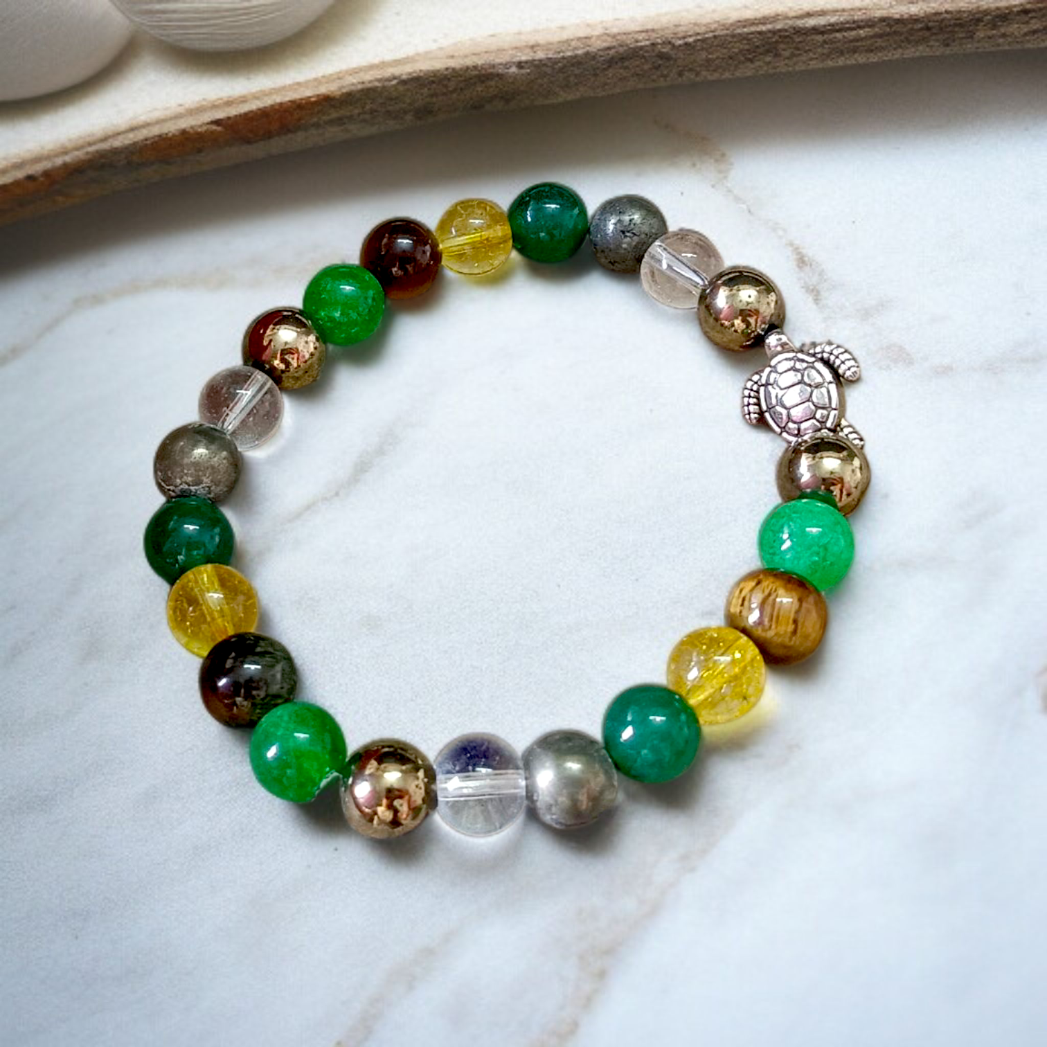 Image of a Money Magnet Bracelet made of 8mm natural gemstone beads, stretchable design, ideal for attracting wealth and prosperity