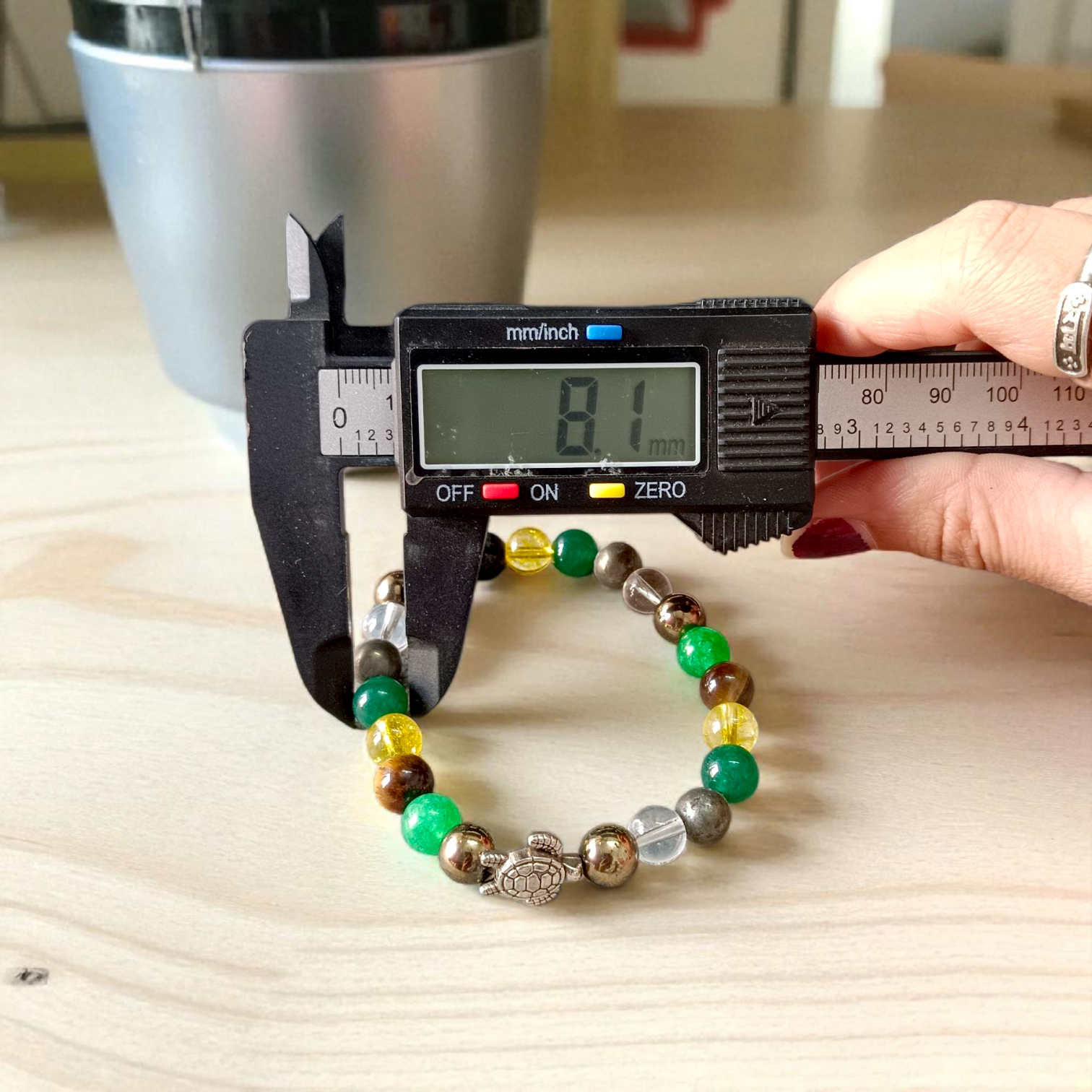 Image of a Money Magnet Bracelet made of 8mm natural gemstone beads, stretchable design, ideal for attracting wealth and prosperity