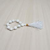 Image of a Natural Howlite Finger Mala with 9+1 lab-certified 8mm Howlite beads, ideal for meditation, peace, and emotional healing
