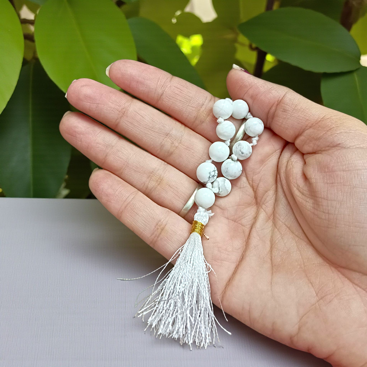 Image of a Natural Howlite Finger Mala with 9+1 lab-certified 8mm Howlite beads, ideal for meditation, peace, and emotional healing