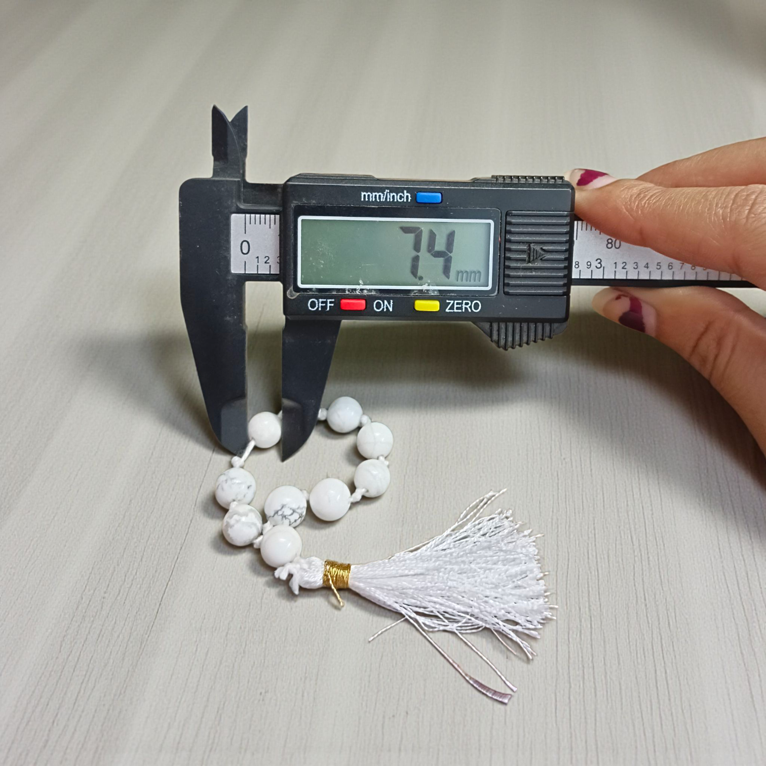 Image of a Natural Howlite Finger Mala with 9+1 lab-certified 8mm Howlite beads, ideal for meditation, peace, and emotional healing