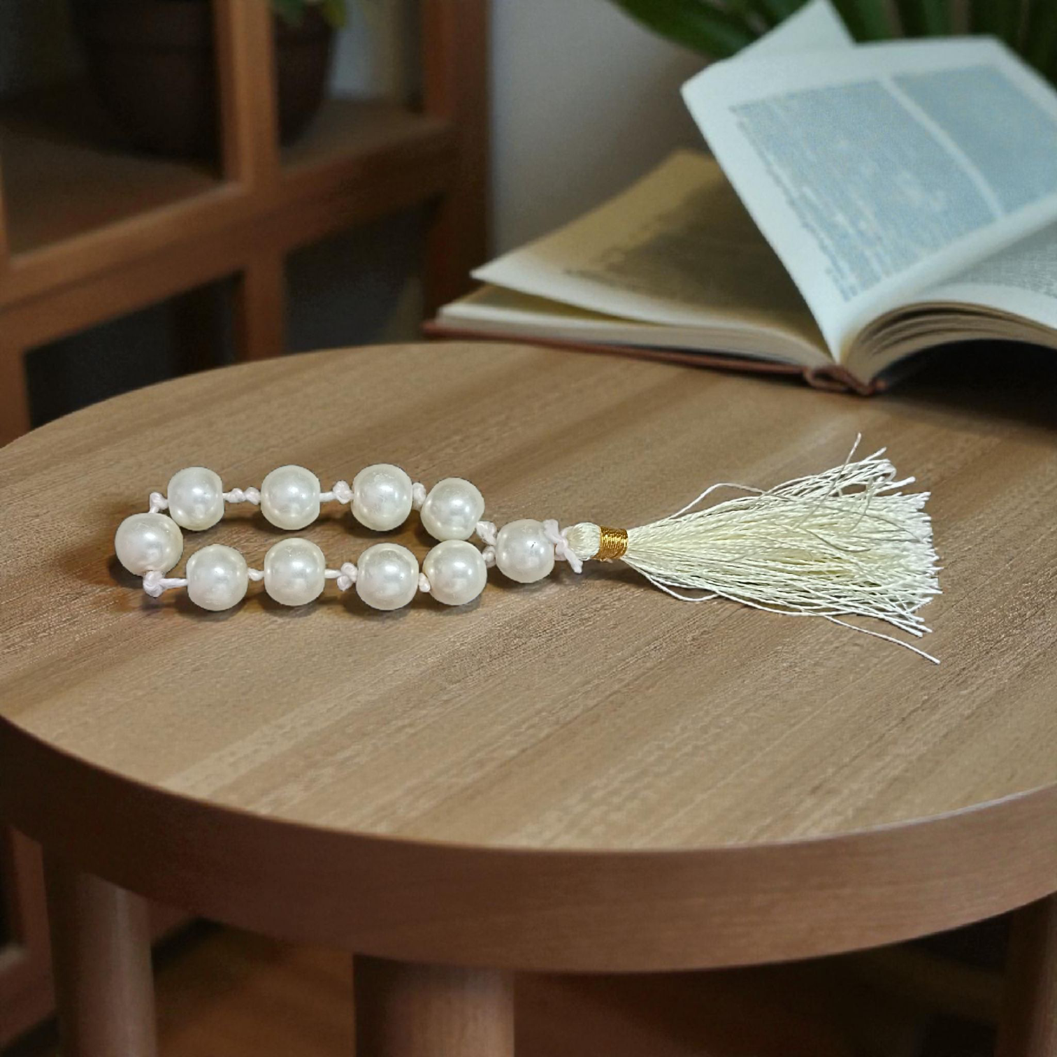 Image of a Natural Pearl Finger Mala with 9+1 lab-certified Moti beads, designed for meditation, peace, and emotional healing